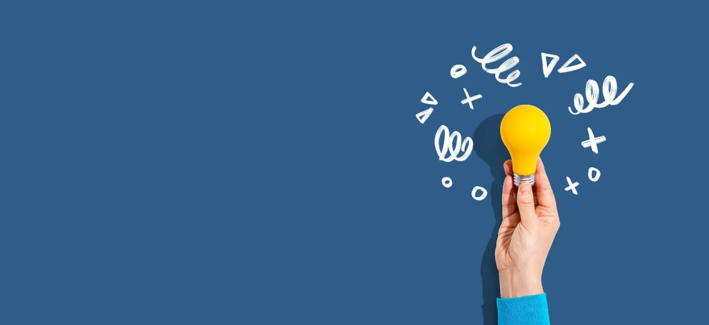 Idea,Light,Bulb,With,Hand,Drawing,Sketch,-,Flat,Lay