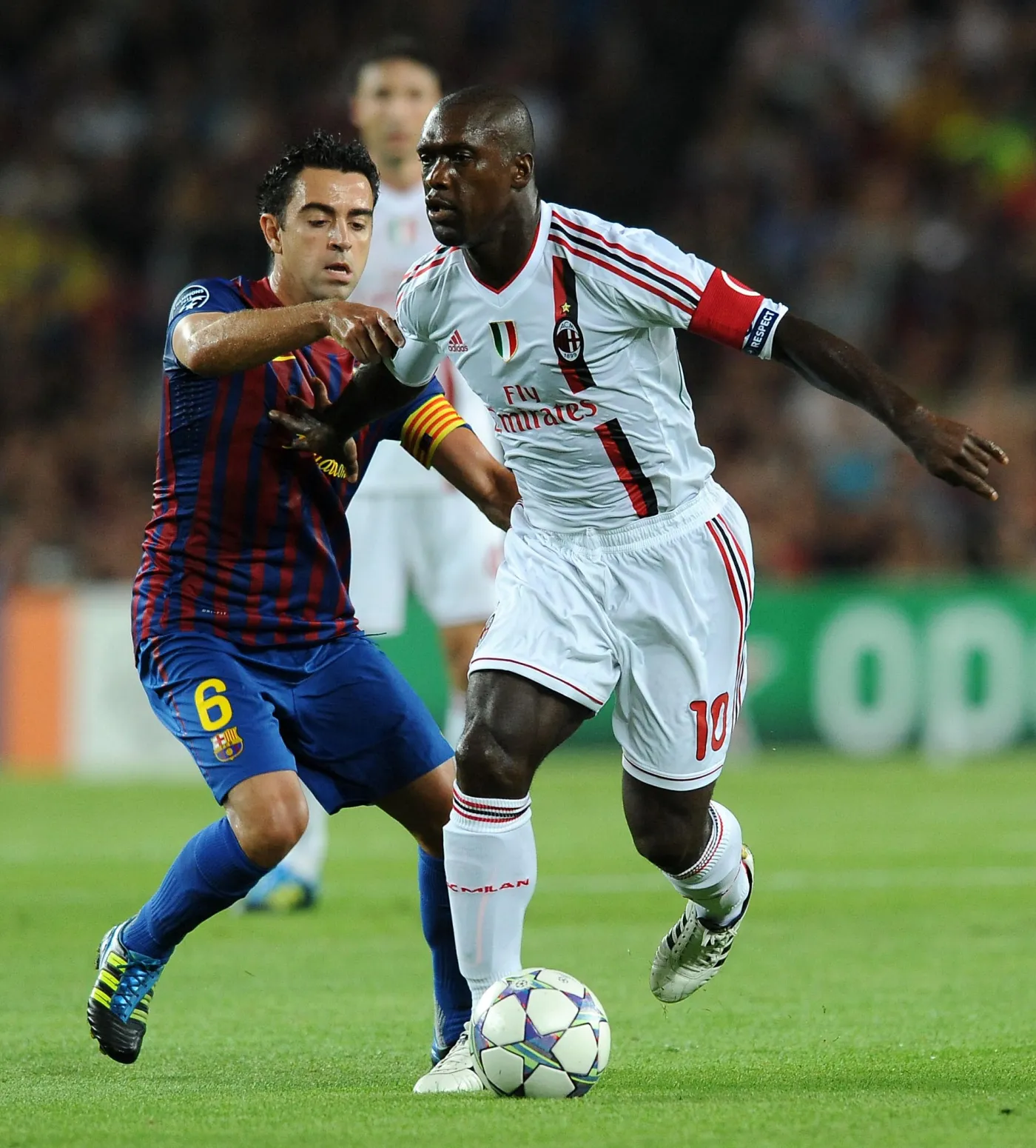 3286538-xavi-hern-ndez-i-clarence-seedorf.jpg
