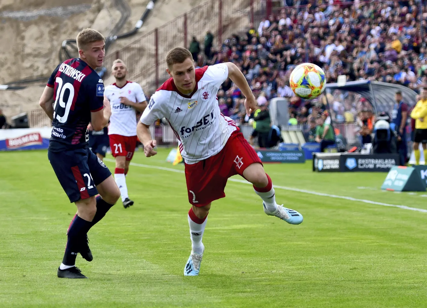 Piłkarz Pogoni Szczecin Marcin Listkowski (L) oraz Jan Grzesik (C) i Jan Sobociński (P) z ŁKS Łódź podczas meczu Ekstraklasy