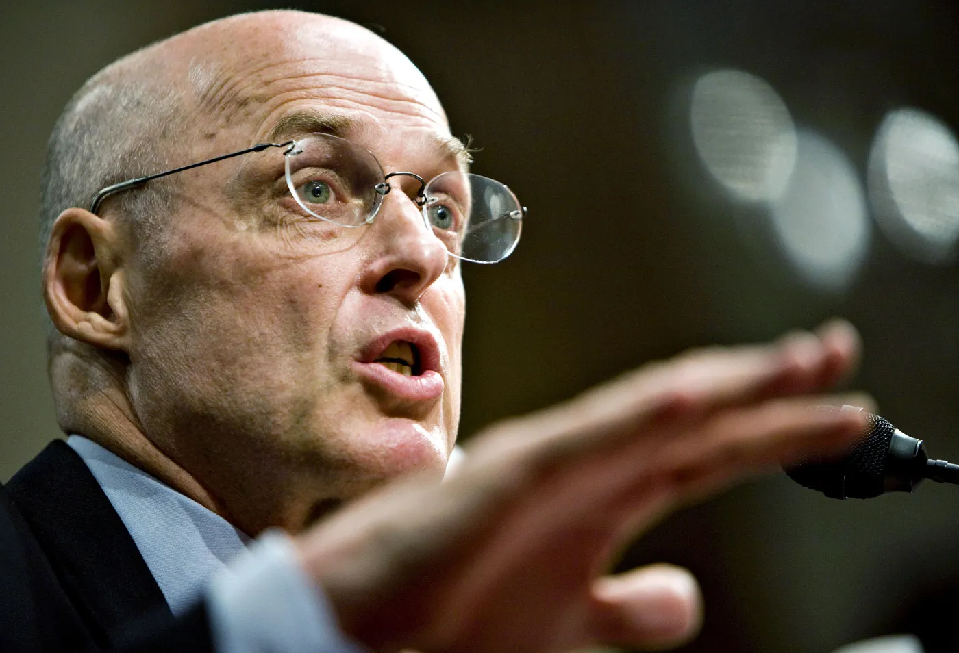 Paulson stawia na fuzje i przejęcia banków