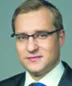 2152325-przemyslaw-kozdoj-prawnik-w-kancelarii.jpg