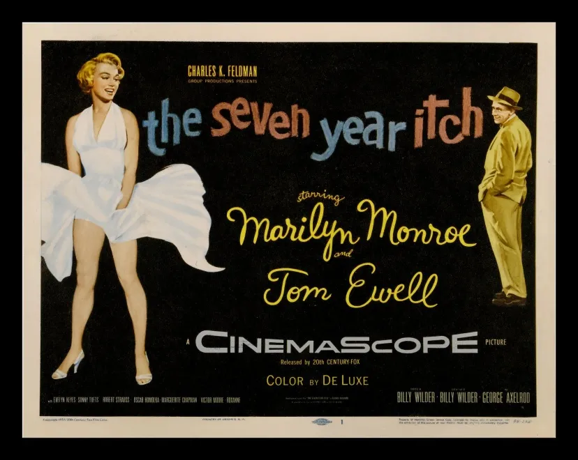Plakat reklamujący film z udziałem Marilyn Monroe, "Słomiany wdowiec".