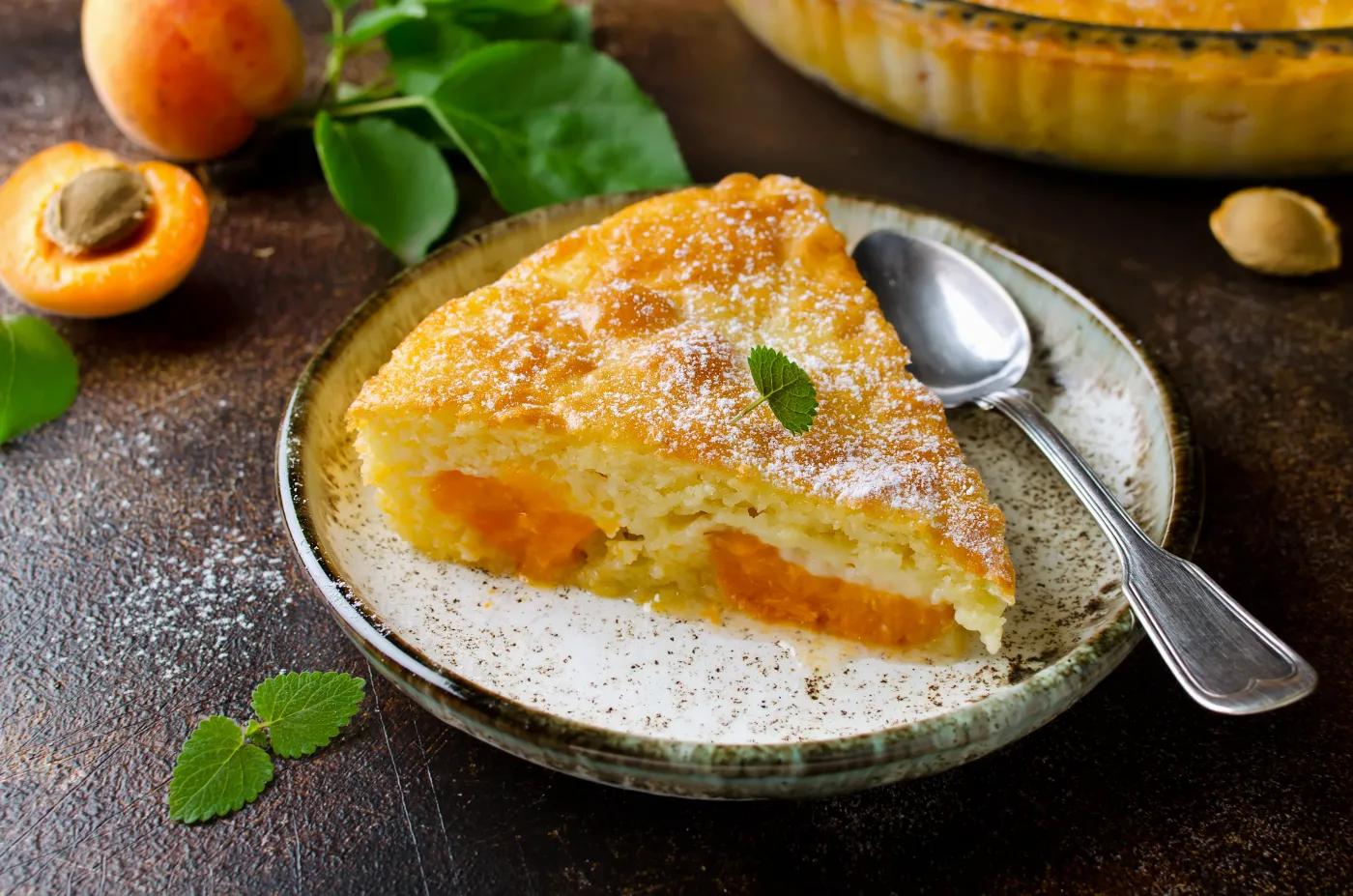 Sponge,Cake,With,Apricots,,Dusted,With,Icing,Sugar.,Homemade,Cake