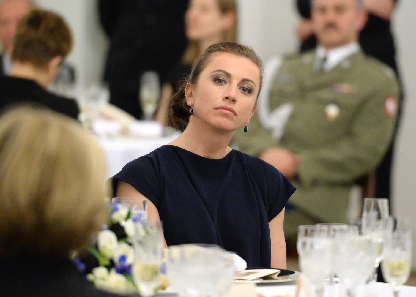 Biegaczka narciarska Justyna Kowalczyk podczas oficjalnego obiadu na cześć prezydenta Estonii Toomasa Hendrika Ilvesa w Pałacu Prezydenckim w Warszawie