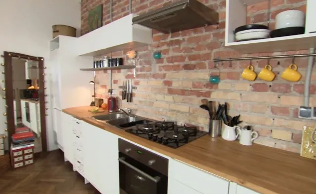 Jak stylowo urządzić otwartą kuchnię? "Nie może być idealnie"