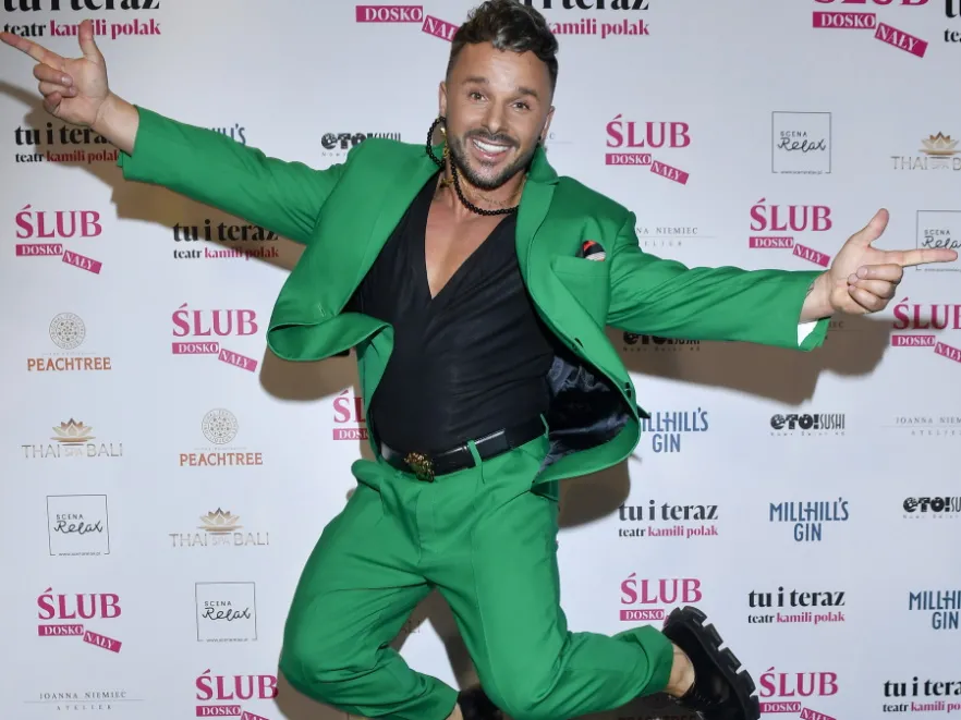 Usta do ust: Qczaj z partnerem wybuchnęli namiętnością na ściance. FOTO