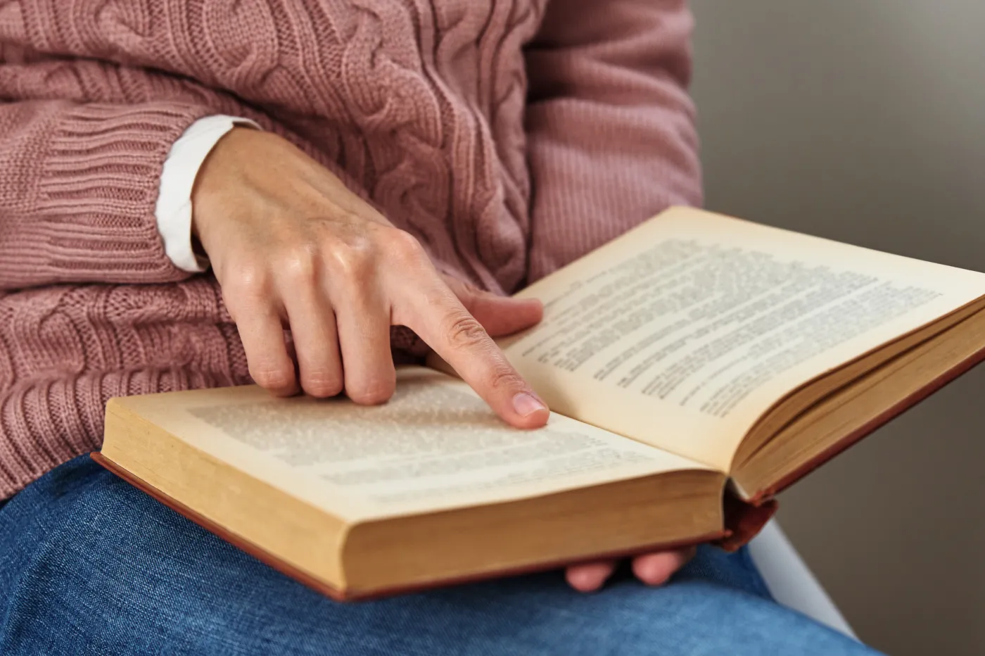 Woman,Sitting,And,Reading,Book.,Relaxing,Concept