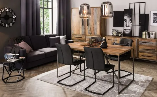 Jak urządzić mieszkanie? Moda na czarne meble i dodatki