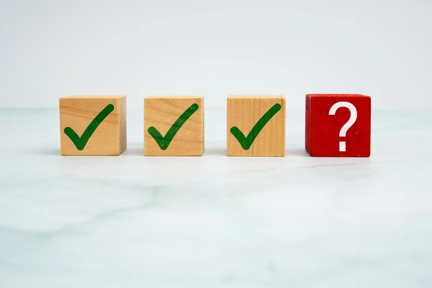Wooden,Cubes,With,Green,Check,Marks,Beside,Red,Cube,With