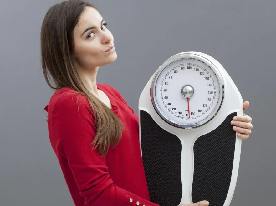 Kobieta z wagą