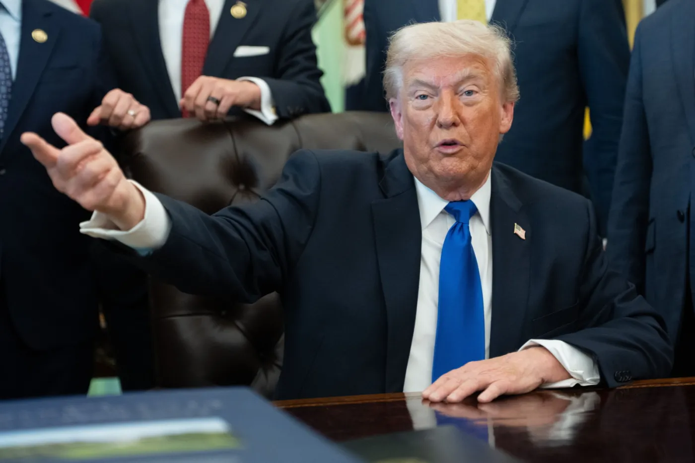 US President Donald Trump signs executive orders at White House