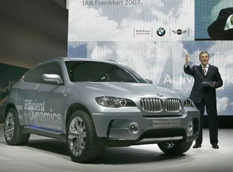 Norbert Reithofer, CEO of German carmaker BMW presents the companys new X6 ActiveHybrid concept car during the international car show IAA in Frankfurt September 11, 2007. The worlds biggest car show will be open to the public from September 13 to 23. REUTERSAlex Grimm GERMANY