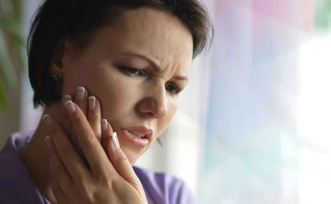 Kobietę boli ząb