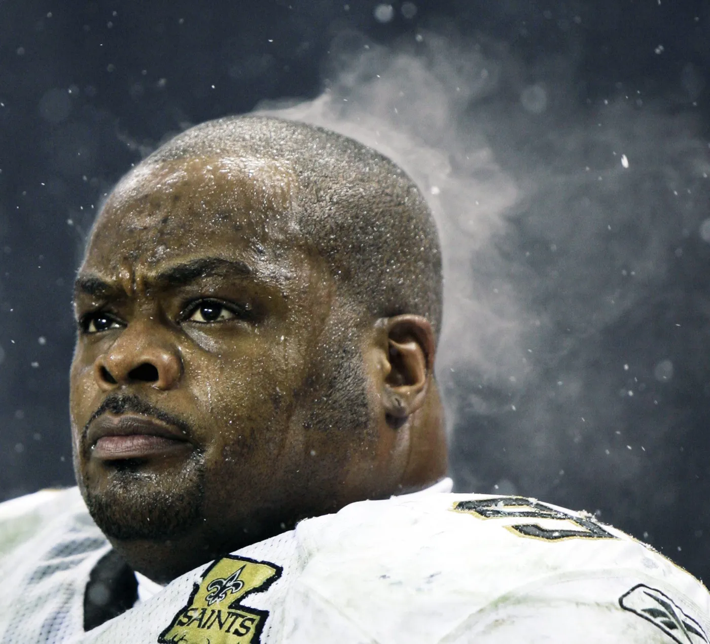  FOR USE WITH YEAR END AS DESIRED--FILE  Steam rises off the head of New Orleans Saints defensive tackle Hollis Thomas as he watches from the bench during the fourth quarter of the NFC championship football game against the Chicago Bears, in this Jan. 21, 2007, file photo in Chicago. AP PhotoAlex Brandon, file