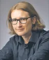 Doktor Łukasz Olejnik, niezależny konsultant, badacz związany z King's College London