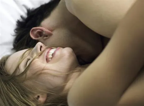 Couple in Bed --- Image by  Ole GrafzefaCorbis