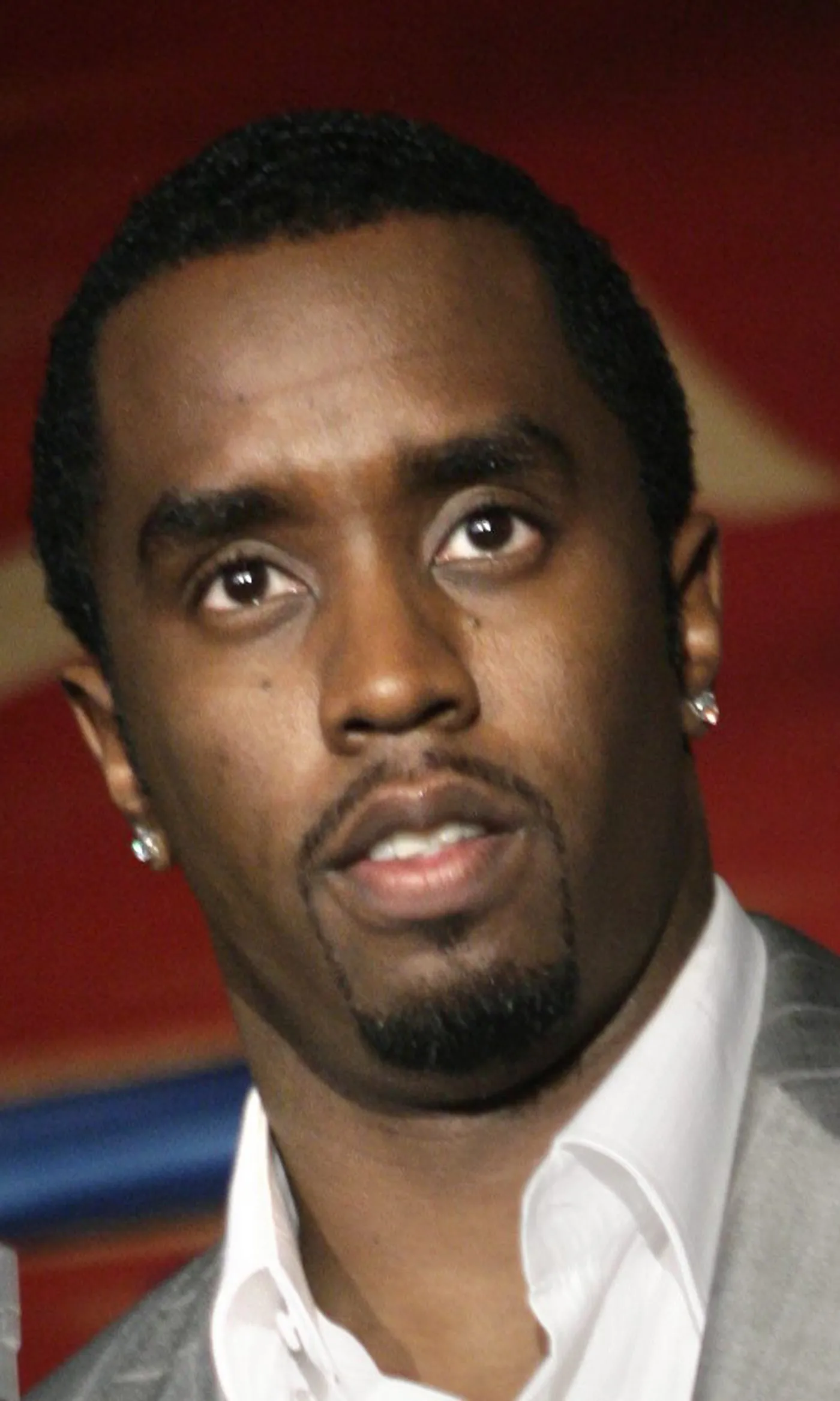 Sean Diddy Combs poses with a bottle of Ciroc vodka at a news conference in New York, Wednesday, Oct. 24, 2007.  The hip-hop mogul has inked a multiyear deal in which he will help develop the Ciroc brand, one of Diageo PLC apos;s super-premium vodka lines, for a 50-50 share in the profits.    AP PhotoSeth Wenig