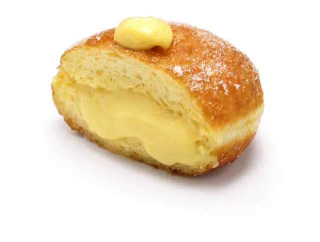 Puszyste pączki bomboloni. Wypróbuj przepis, którym zachwycają się Włosi