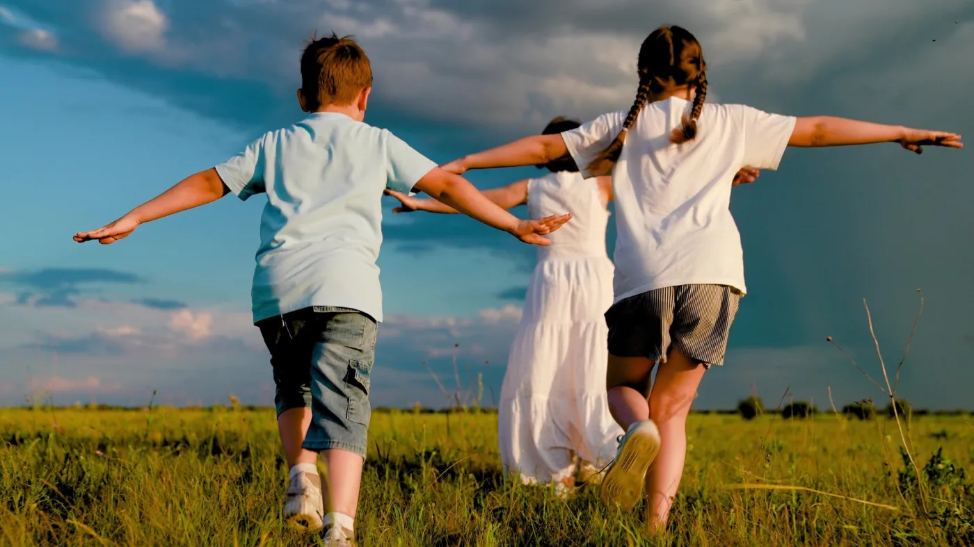 Mother,Children,Play,Superheroes,With,Their,Hands,Up.,Happy,Family