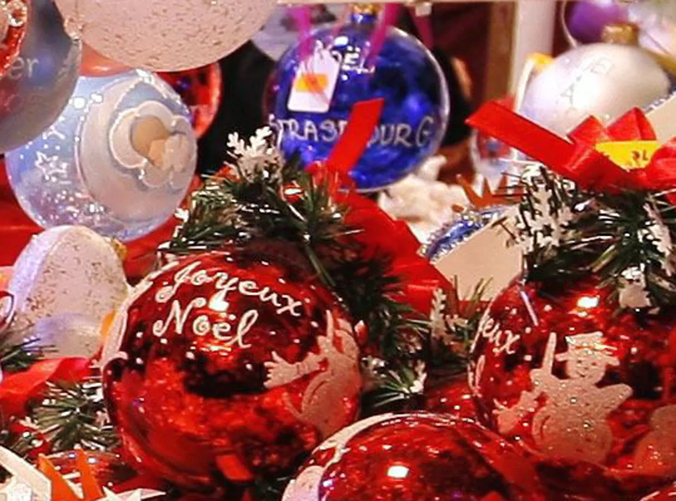 Tourists look at Christmas decorations sold at the traditional Christmas market in Strasbourg December 7, 2007. Taking place since 1570, Strasbourg apos;s  quot;Christ Child Market quot; is known as the oldest French Christmas market. REUTERSVincent Kessler  FRANCE