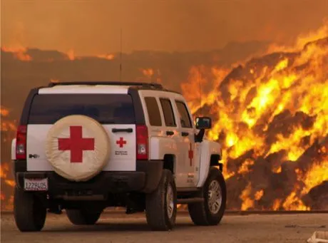 HUMMER Helps Battle Wildfire Over Holiday Weekend - Trained American Red Cross volunteers of San DiegoImperial Counties Chapter the used their HUMMER H3 to deliver critical nourishment to more than 100 firefighters battling hay fires in Seeley, California over the holiday weekend. This H3 is one of 19 HUMMER Red Cross response vehicles in service around the country. Photo credit Brad Mellon, American Red Cross, San DiegoImperial Counties Chapter. X07HMH3089  United States