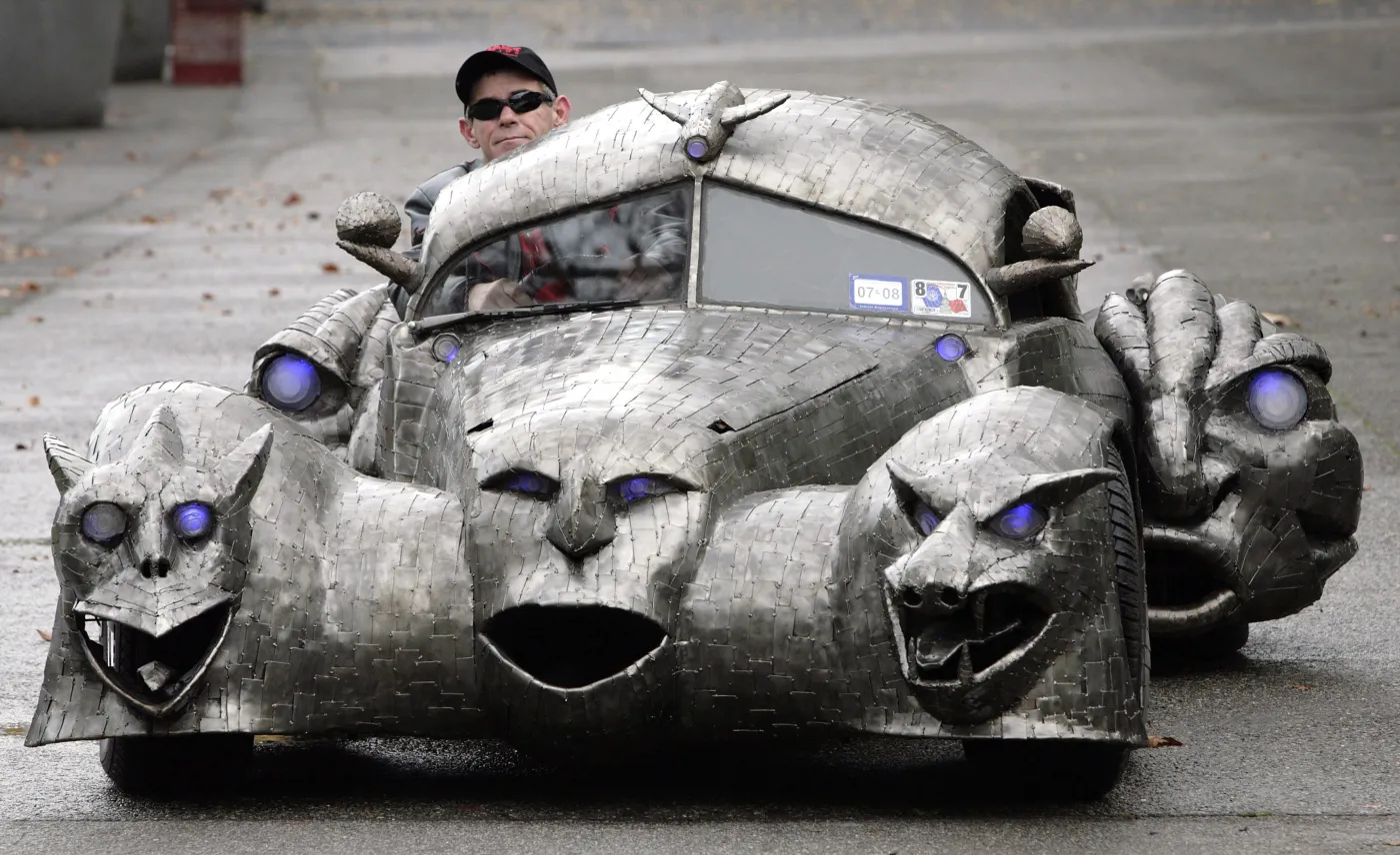 Artist William Burge from Houston Texas sits in his art-car  quot;Phantoms quot; at a presentation prior to the Essen Motor Show 2007 in the city of Essen, Germany, Monday, Nov. 26, 2007. The car is based on a 1968 Volkswagen Beetle and will be shown at the automobile fair in Essen from Dec. 1 to 9, 2007.  AP PhotoMartin Meissner