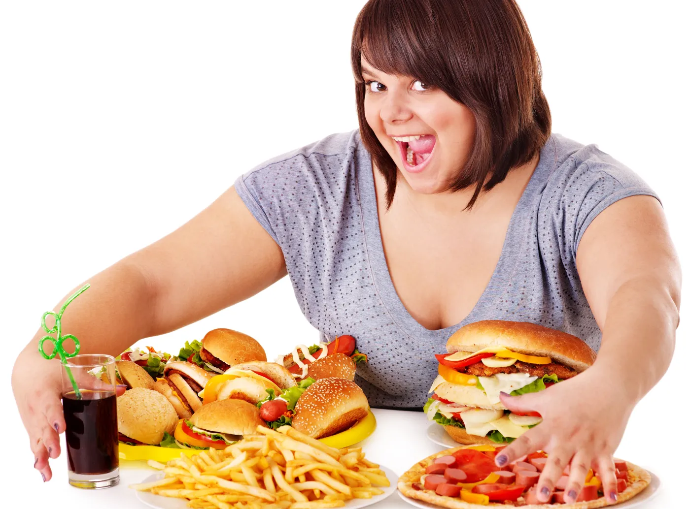 Otyła kobieta je fast food