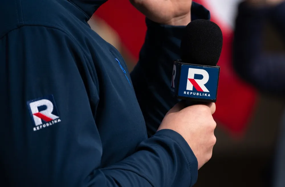 Krakow,,Poland,-,March,16,,2024:,Reporter,Holding,Microphone,With