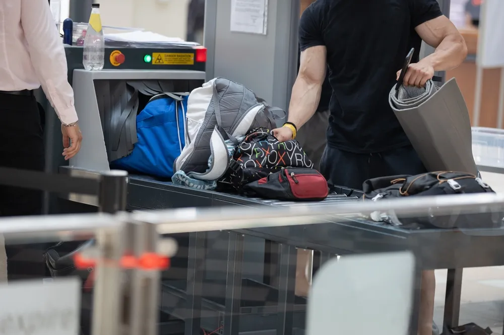 Bags,,Backpacks,,And,Personal,Effects,X-rayed,At,The,Access,Gate.
