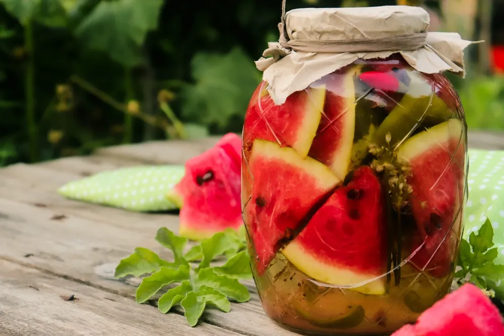 Pickled,Pieces,Of,Red,Watermelon,In,A,Glass,Jar,On