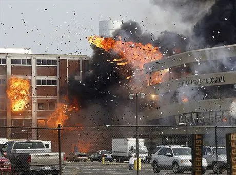 Brachs Candy building,left, and parking building, made to look like, Gother General Hospital, implode at the corner of Cicero Avnue and Ferdinand Street during the filming of the Batman movie Dark Knight in Chicago, Wednesday, Aug. 29, 2007.  The Dark Knight is being filmed all over town in Chicago and it is the biggest movie project that Chicago has ever hosted.AP PhotoNam Y. Huh