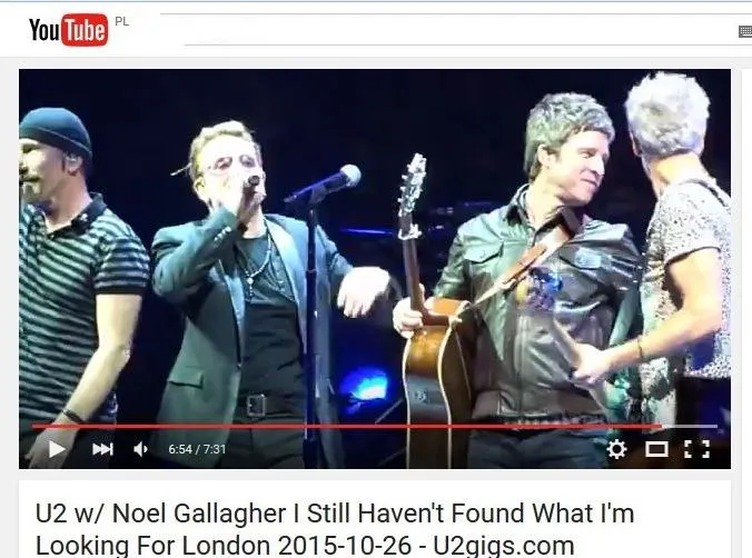 Noel Gallagher na scenie z U2