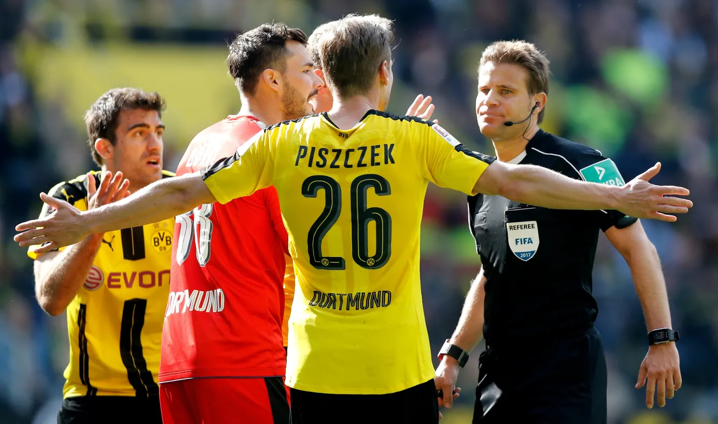 Roman Buerki, Łukasz Piszczek i Felix Brych