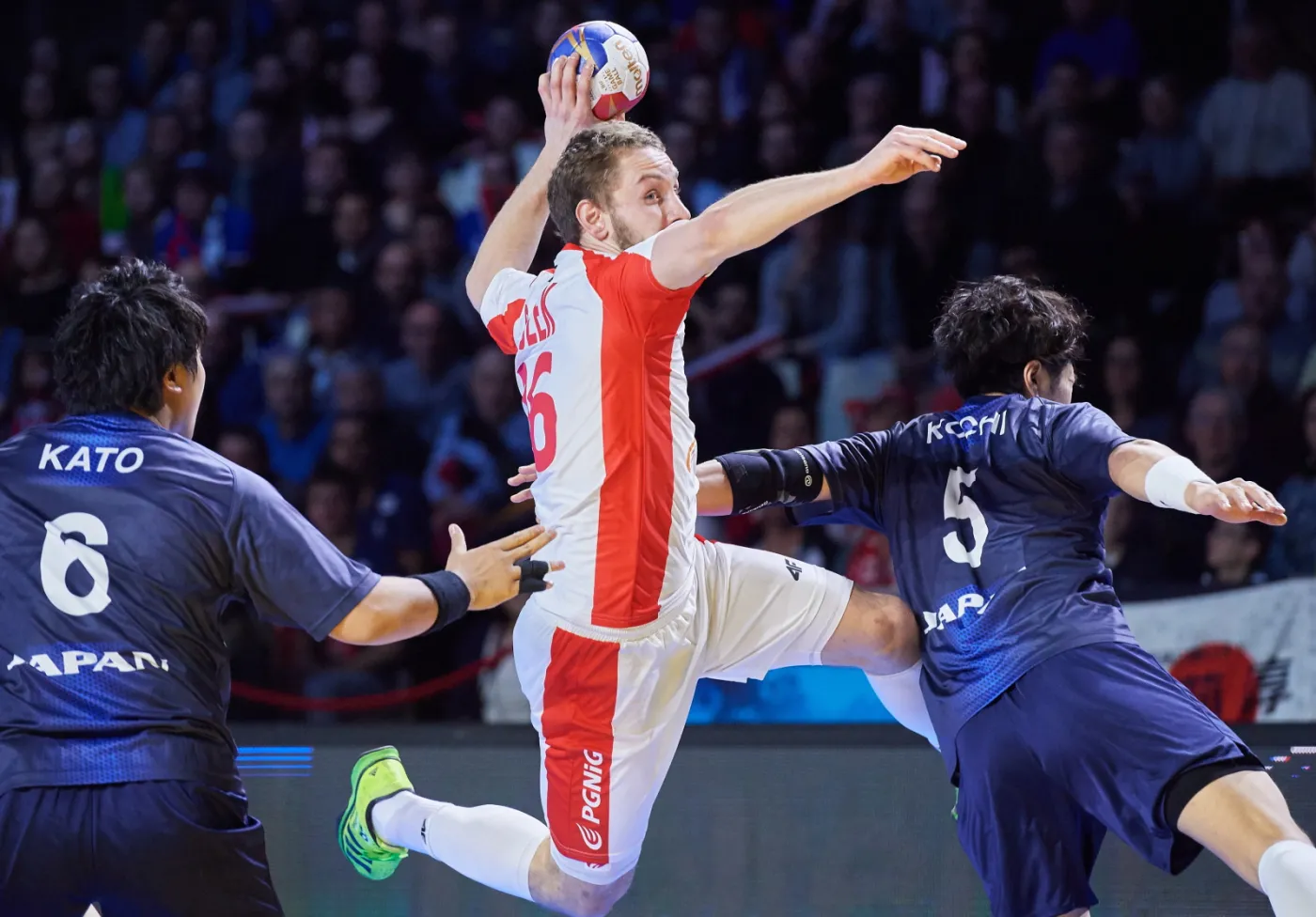 Michał Daszek (C) oraz Takashi Kato (L) i Kairi Kochi (P)