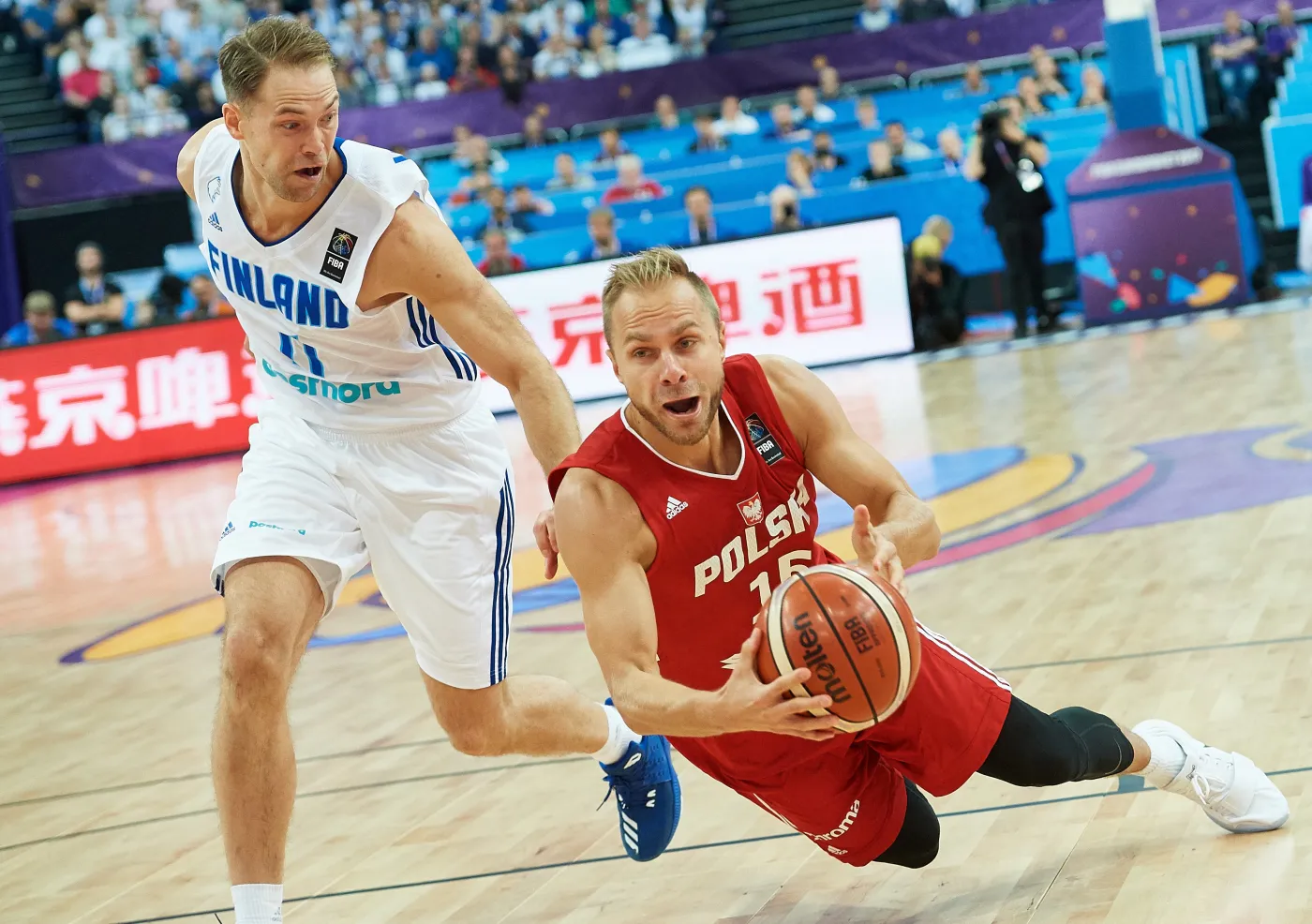 Łukasz Koszarek (P) i Petteri Koponen (L)