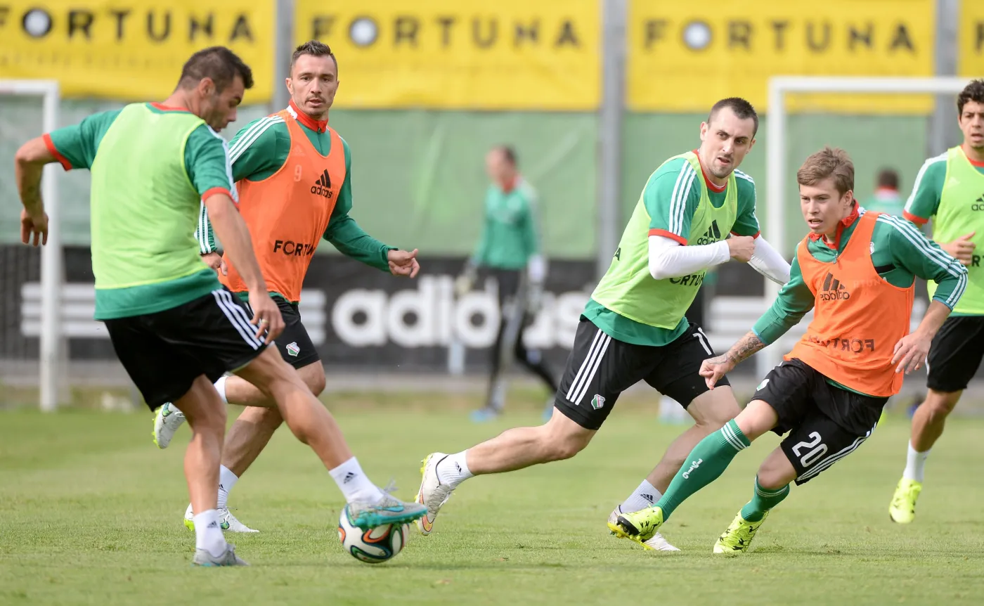 Piłkarze Legii Warszawa (od lewej) Nemanja Nikolić, Marek Saganowski, Michał Kucharczyk i Jakub Kosecki podczas pierwszego treningu drużyny przed zbliżającym się sezonem 2015/2016 T-Mobile Ekstraklasy