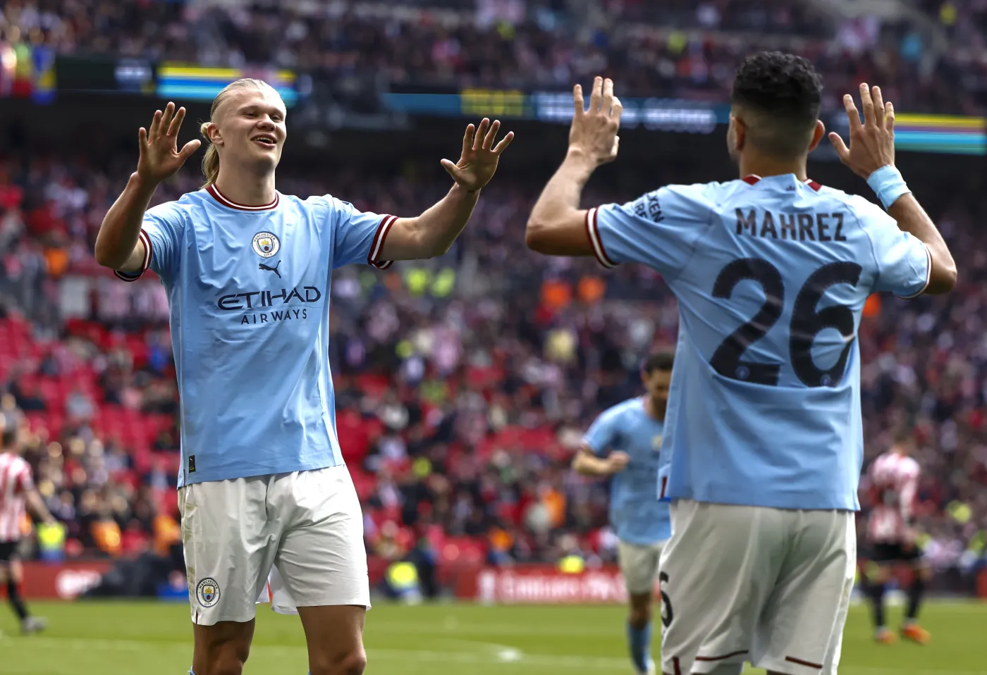 Riyad Mahrez i Erling Haaland