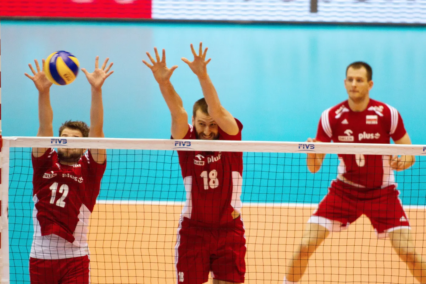 Grzegorz Łomacz (L), Marcin Możdżonek (C) i Bartosz Kurek (P)