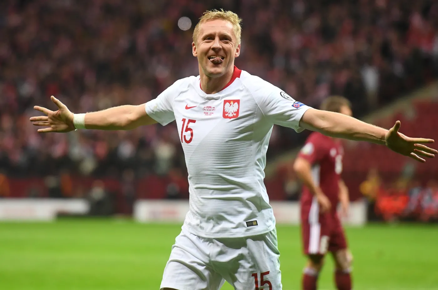 Piłkarz reprezentacji Polski Kamil Glik cieszy się z gola podczas meczu eliminacyjnego mistrzostw Europy z Łotwą