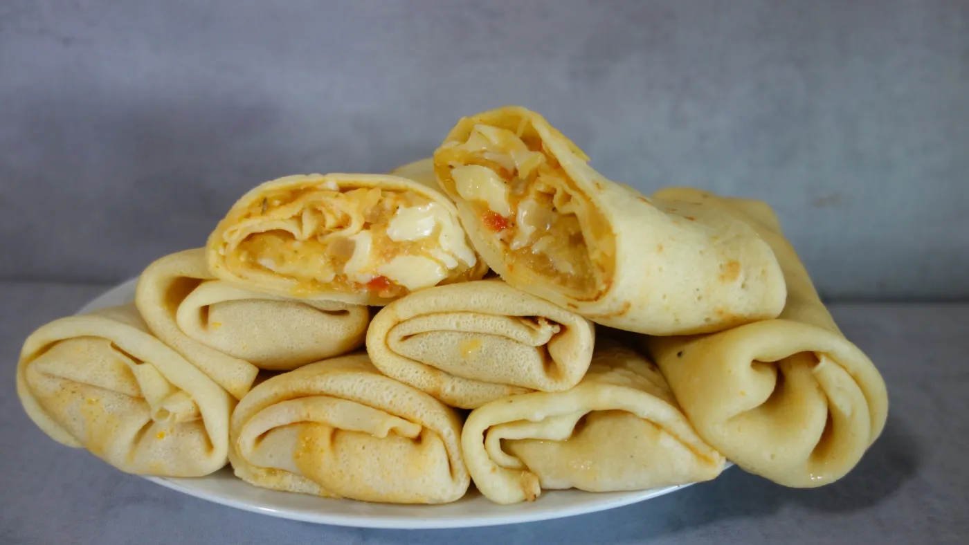 Te naleśniki z cukinią i pomidorami to prawdziwy hit! Pyszny przepis od Heni Foks