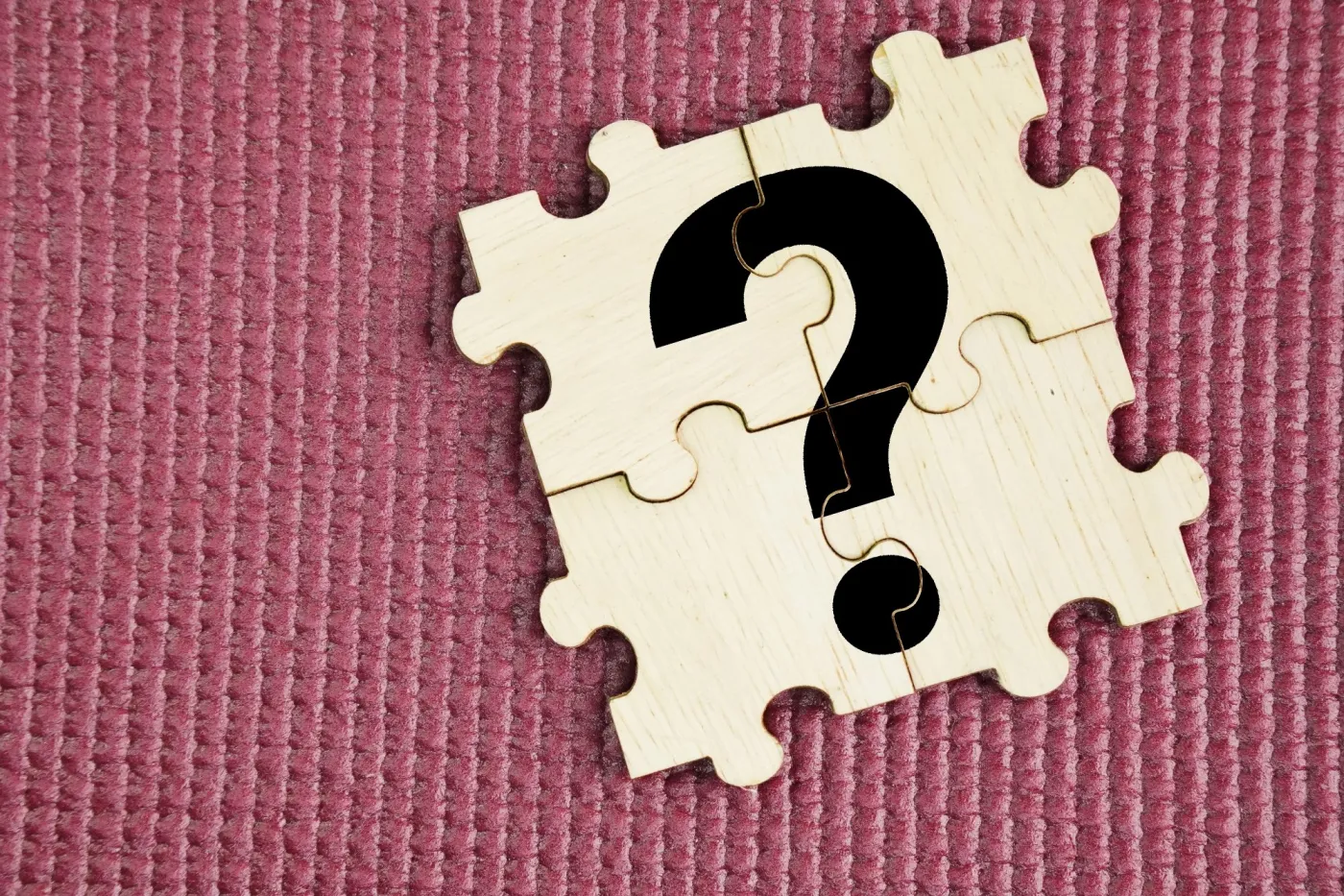Wooden,Puzzle,With,Big,Question,Mark,Symbols.,The,Concept,Of