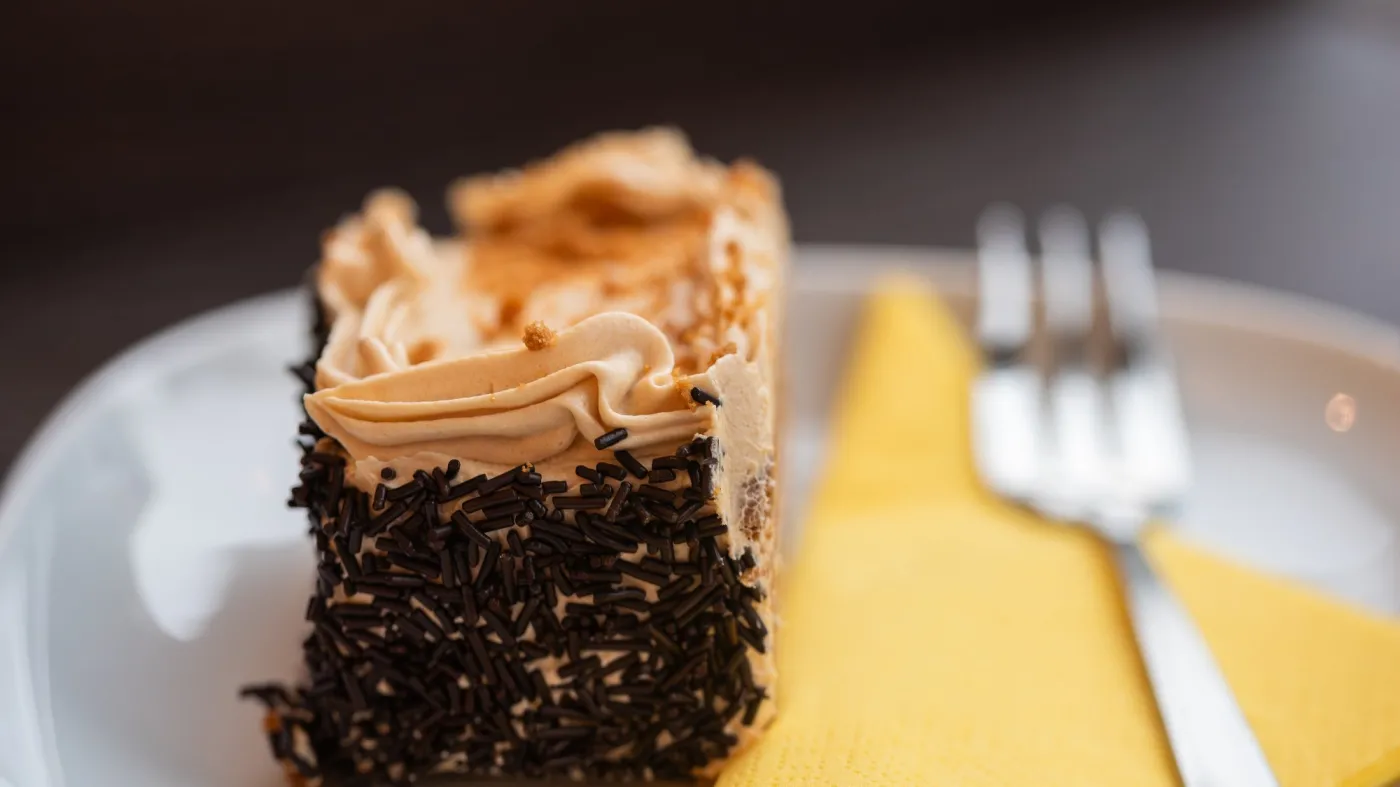 Delicious,Cake,On,A,White,Plate,,Marcinek,Cake.,Dessert,Served