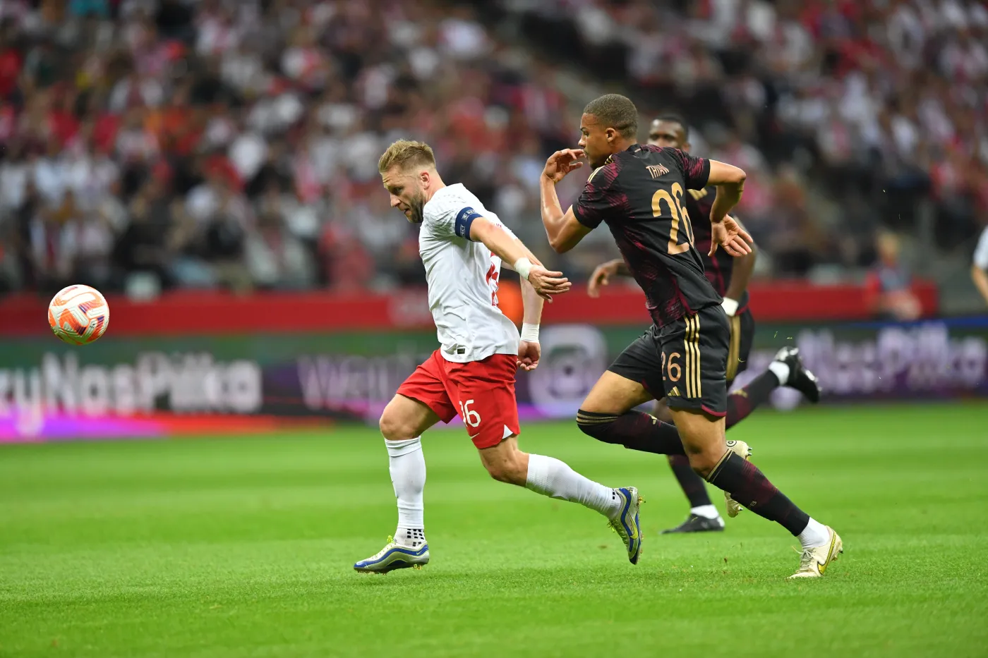 Malick Thiaw i Jakub Błaszczykowski