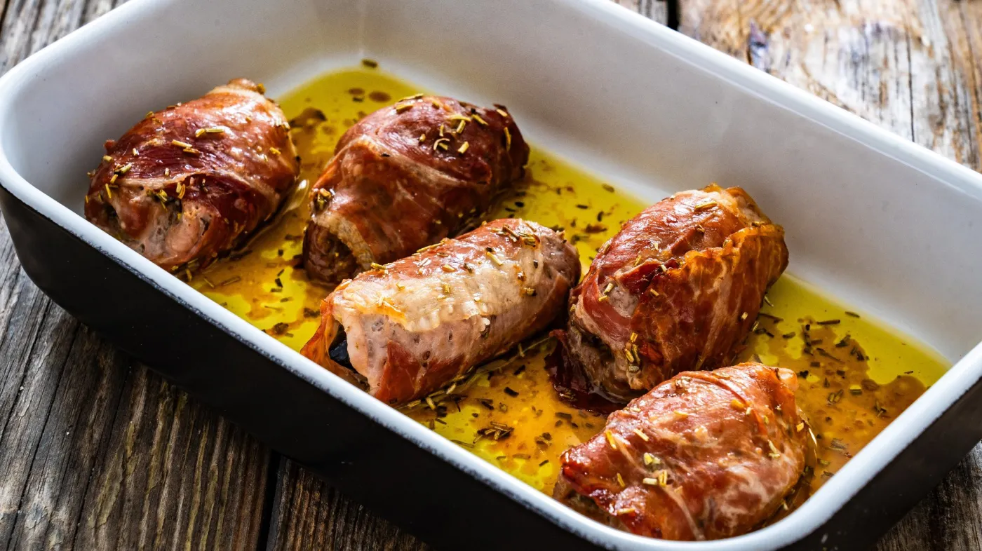 Stuffed,Pork,Loin,With,Dried,Plums,Wrapped,In,Cured,Ham