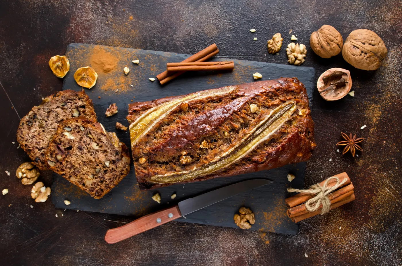 Homemade,Banana,Bread,With,Walnut,And,Cinnamon,On,A,Stone