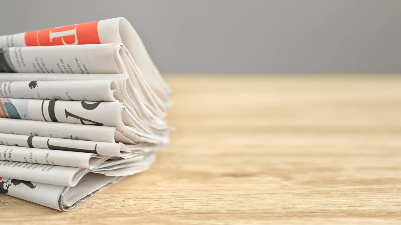 Folded,Newspapers,Wooden,Table,,Closeup.,Banner,For,Design
