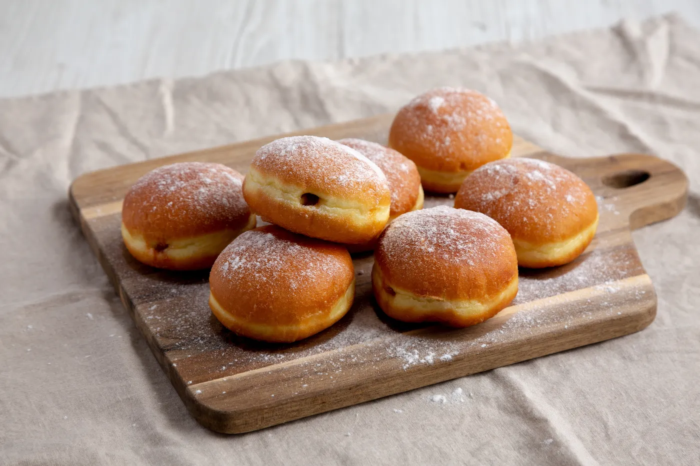 Homemade,Apricot,Polish,Paczki,Donut,With,Powdered,Sugar,On,A