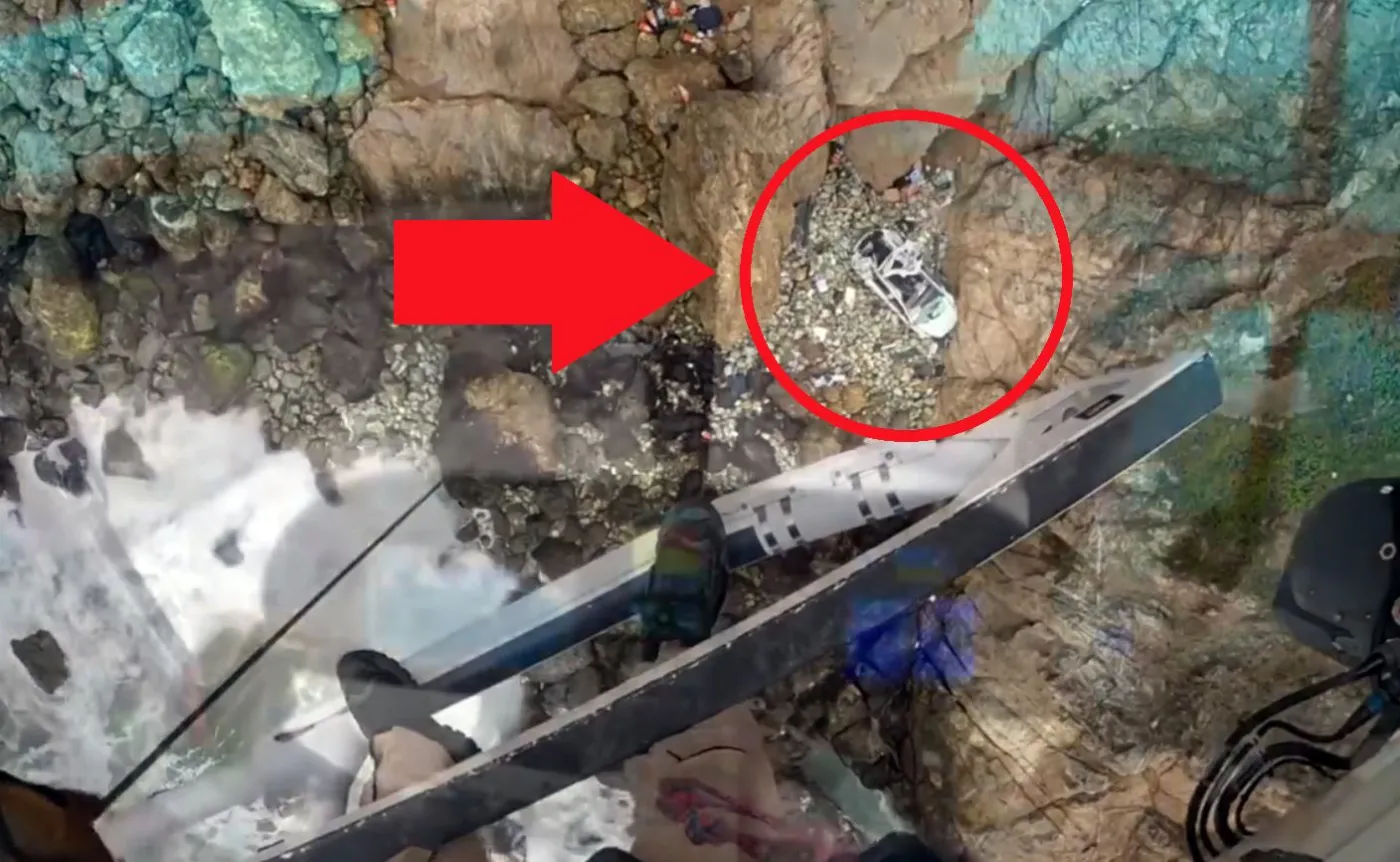 Tesla spadła z klifu nad oceanem. Kadr z filmu - akcja ratunkowa