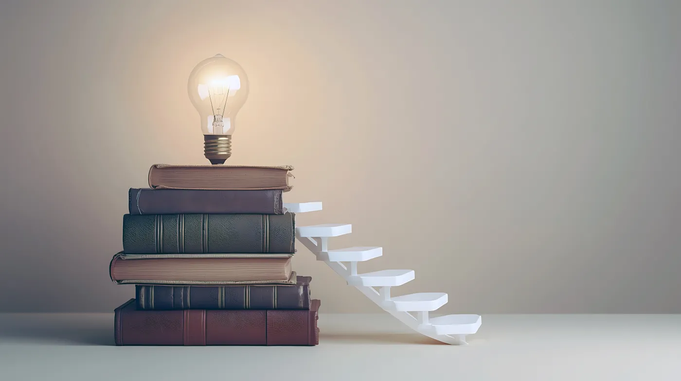 Light,Bulb,On,Books,With,Stairs,,Concept,Of,Education,And