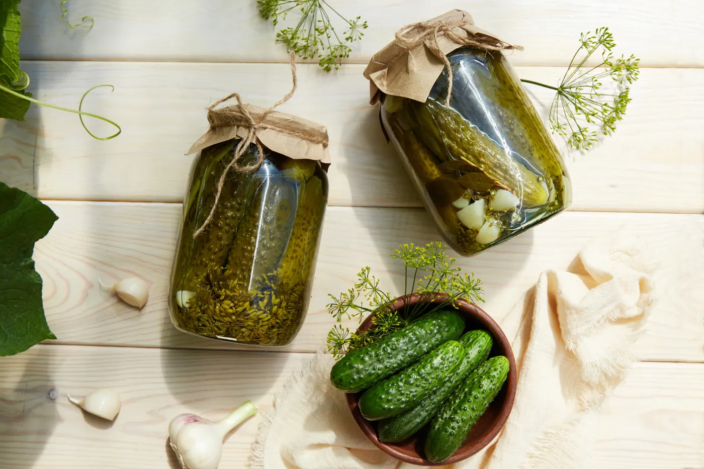 Pickled,Cucumbers,In,Jars,,Fresh,Cucumbers,On,Bowl,,Dill,,Garlic
